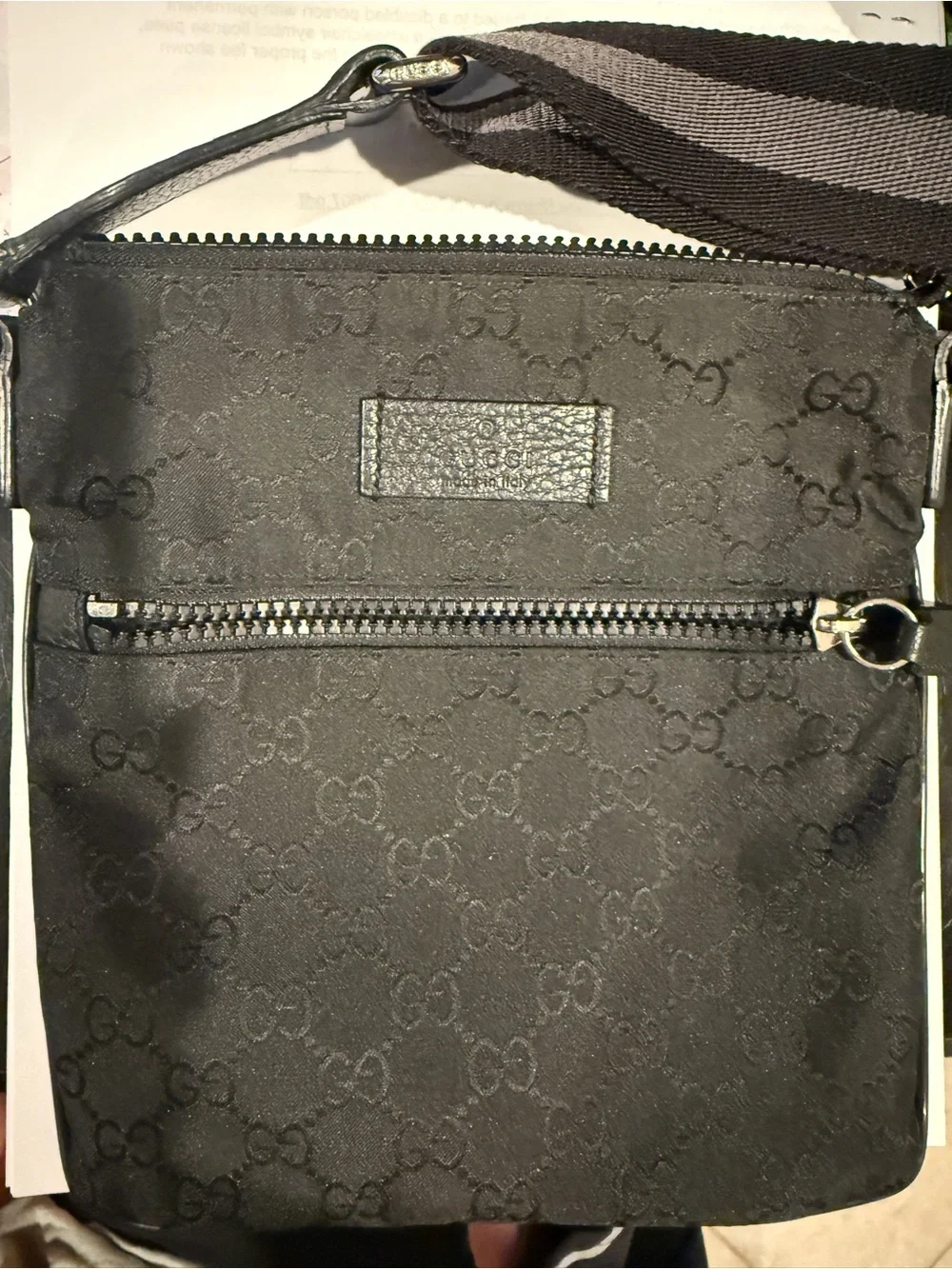 Authentic Gucci Black GG Monogram Messenger Bag with Striped Strap